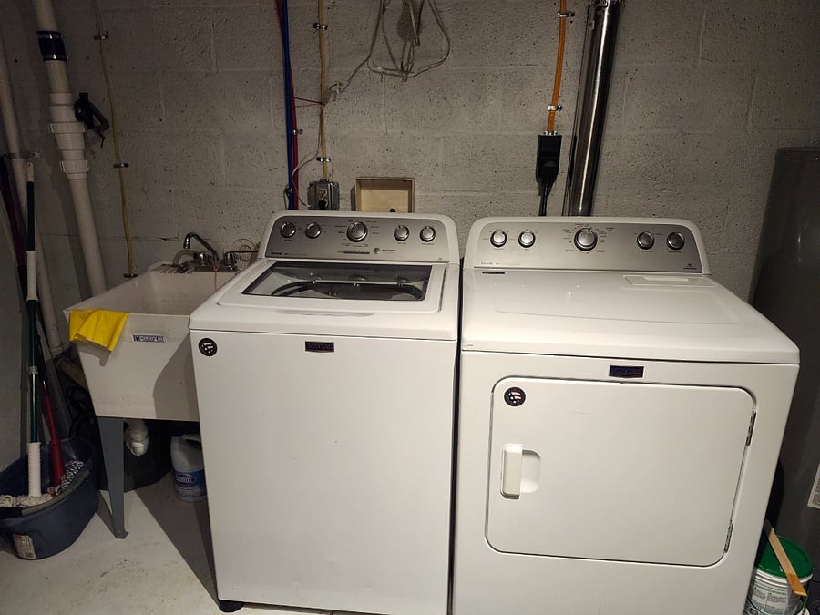 Washer/dryer in the apartment, accessible from the bedroom