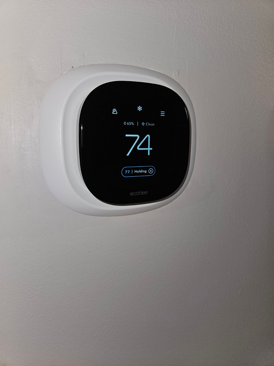 The thermostat is a new Ecobee Pro unit that is a "learning" WIFI device that allows you to have complete and remote control of the apartment environment.