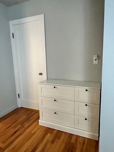 Plenty of bedroom storage with dresser, closet & cubby unit