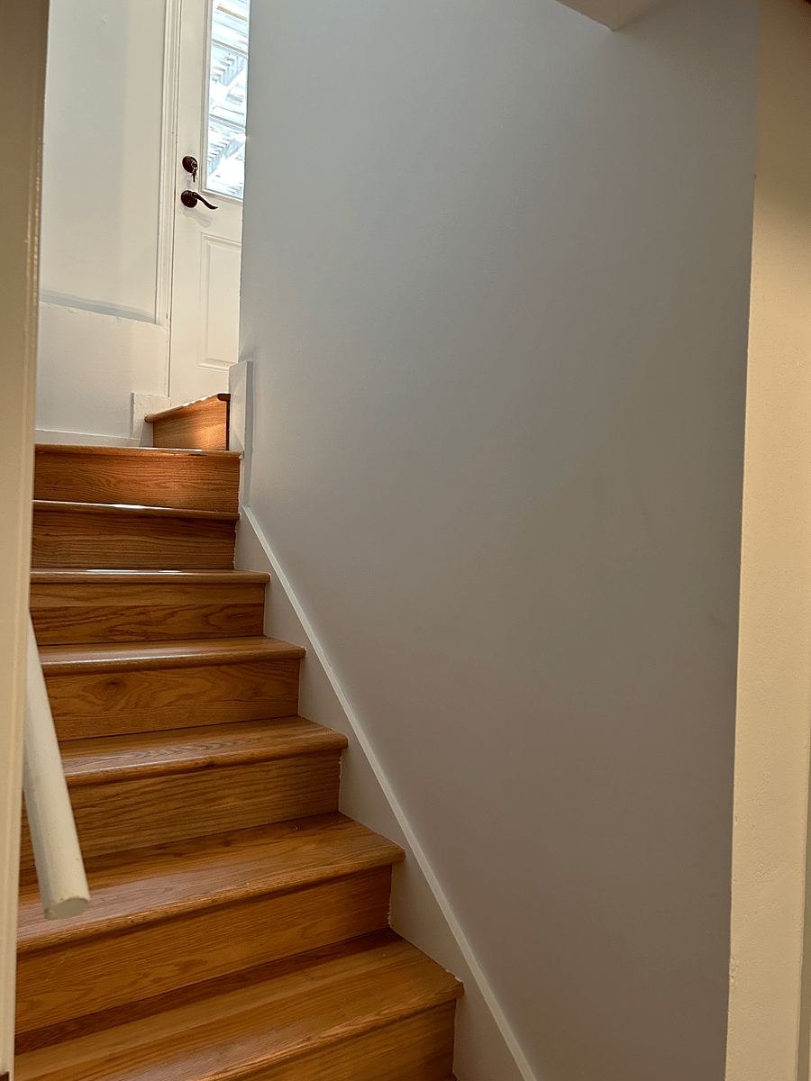Entry stairwell is semi-private and leads to an anteroom where shoe removal is encouraged
