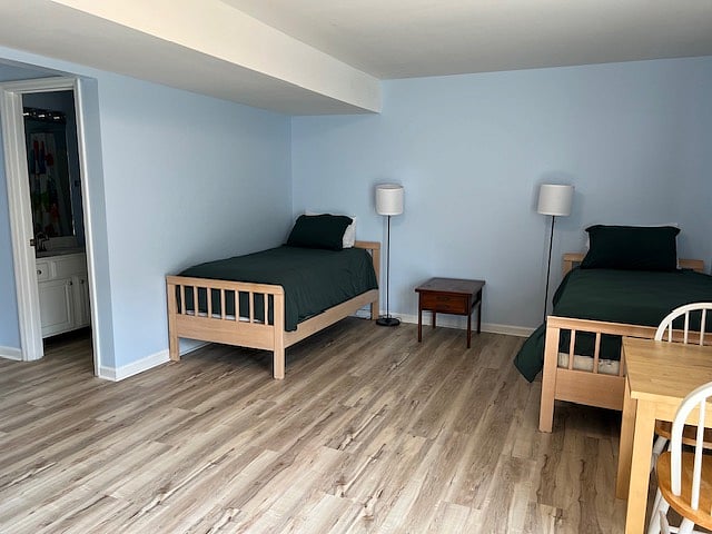 Two single beds in second living area.