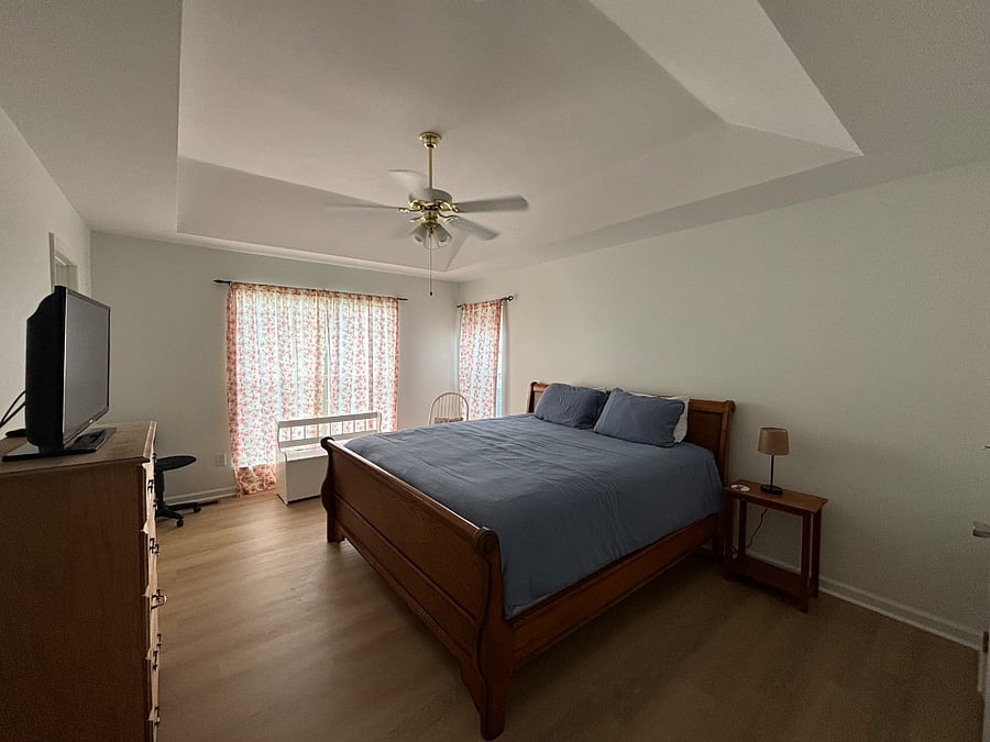 Master bedroom with king sized bed
