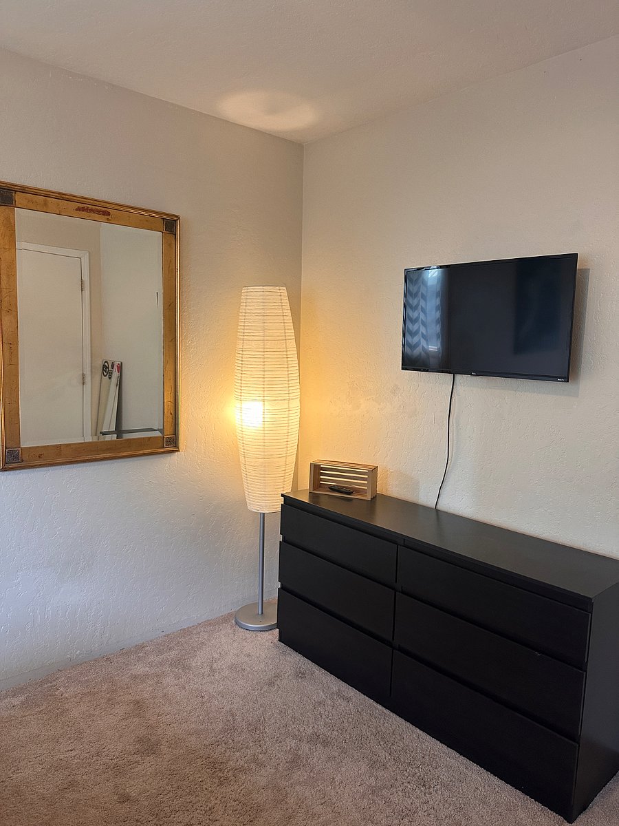 3rd bedroom dresser with TV.