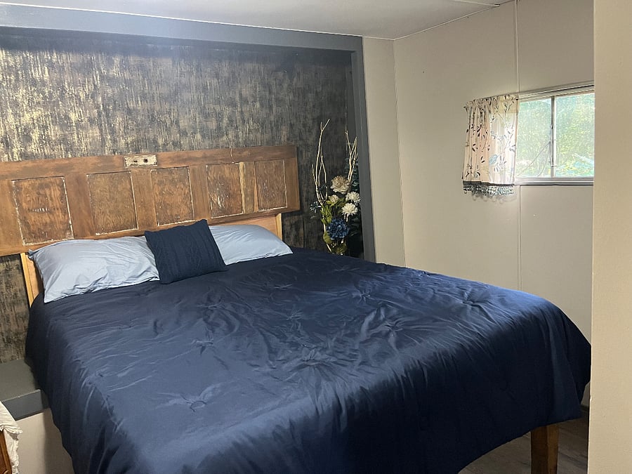 queen mattress, 2 windows, exit door from bedroom to outdoors available