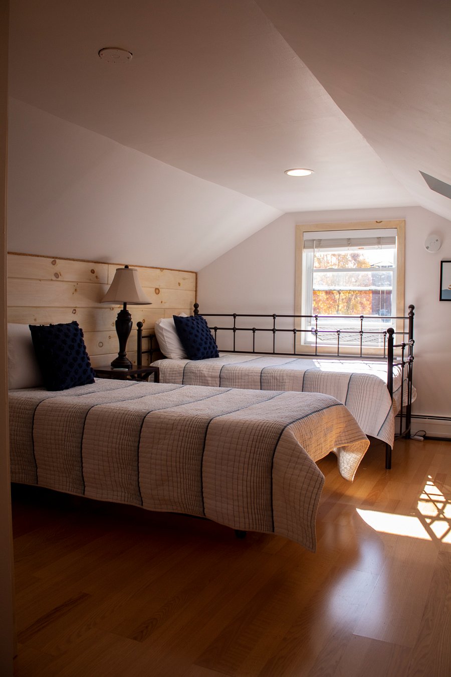 3rd floor bedroom with two twin beds and two twin cubby beds