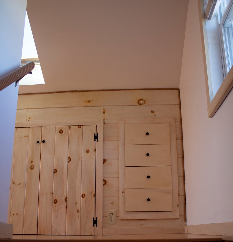 3rd floor bedroom includes a small closet and built in bureau drawers. 