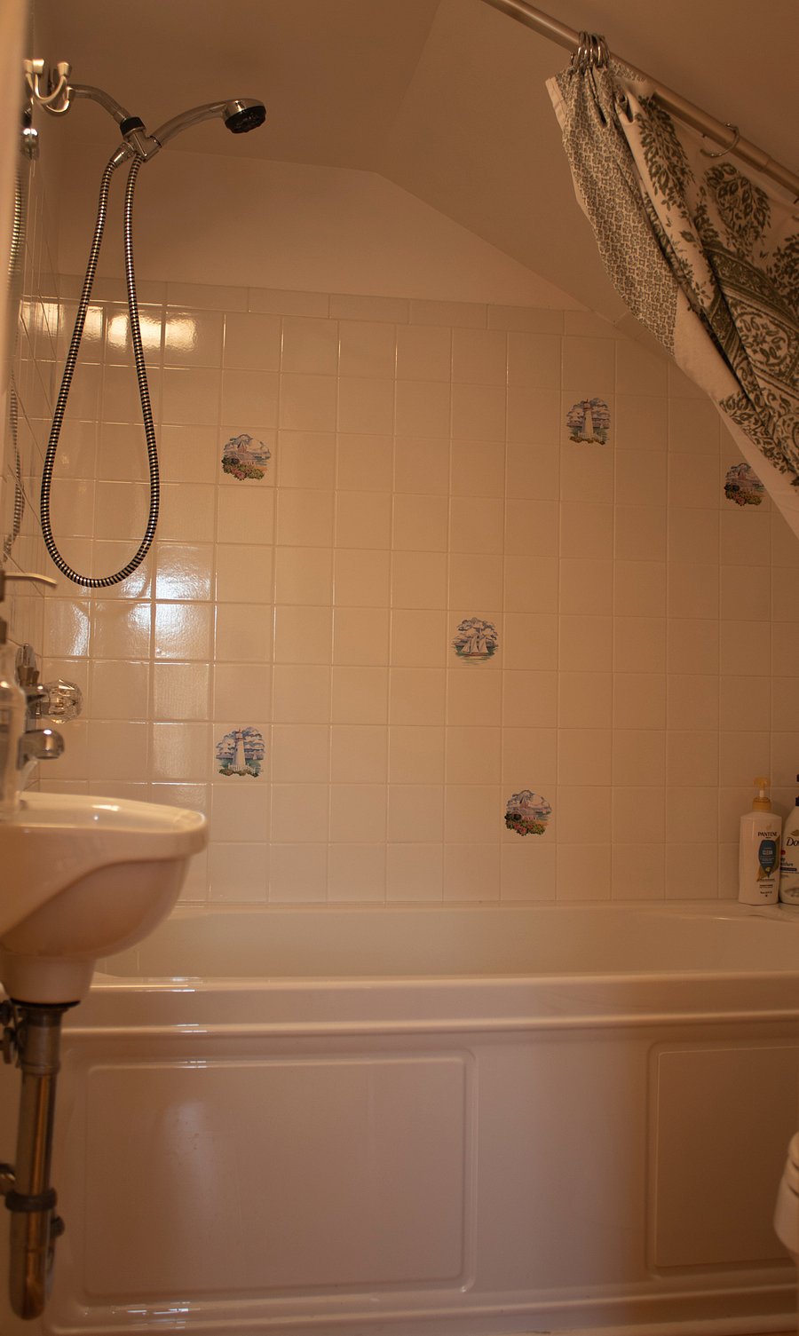 3rd floor bathroom includes a tub and shower
