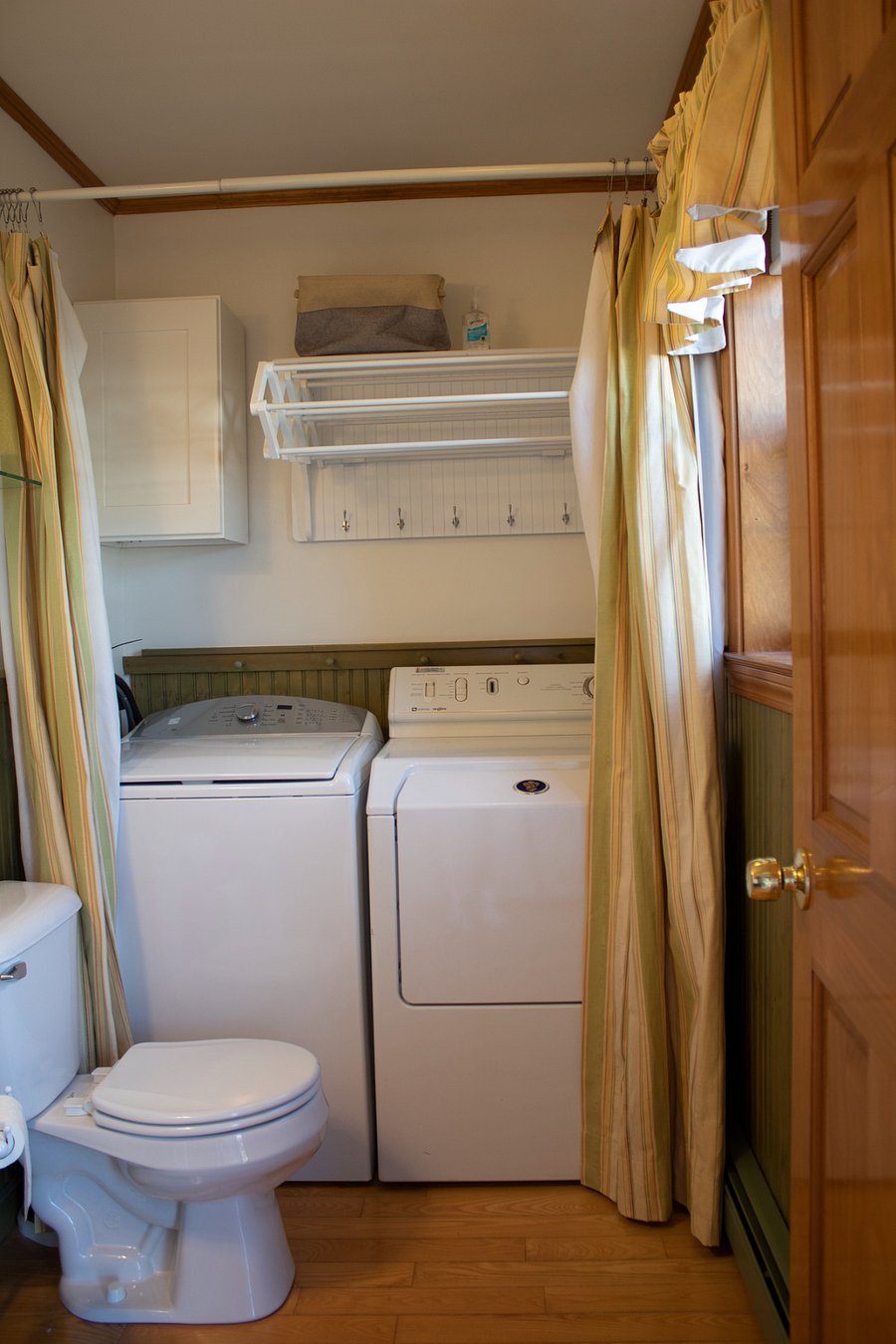 First floor bathroom includes a washer and dryer. 