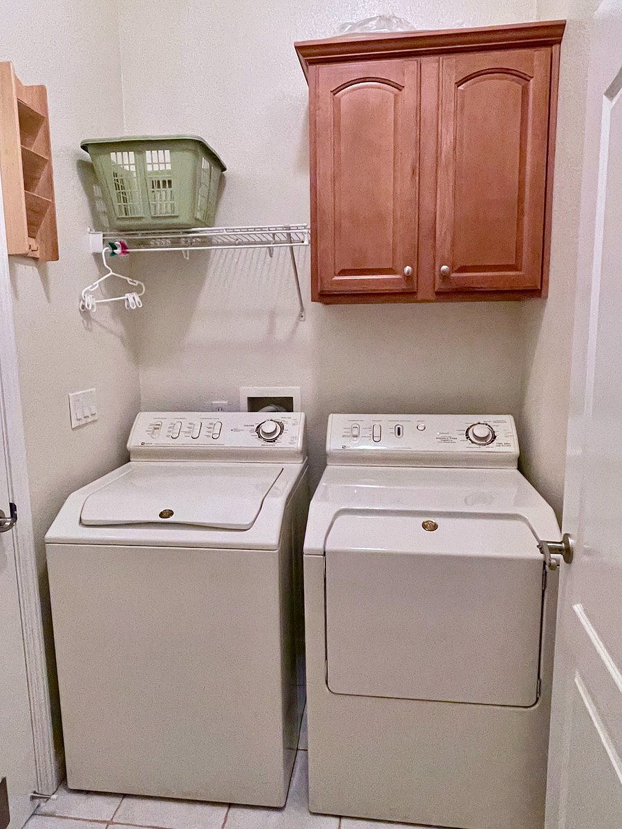 Laundry is inside. Additional dryer is located in the garage