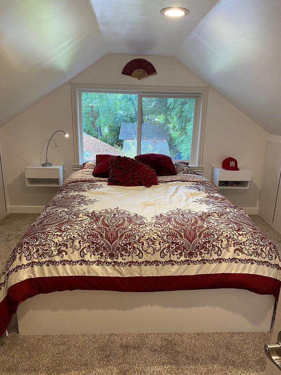 Bedroom #2 has a queen bed and loads of storage!