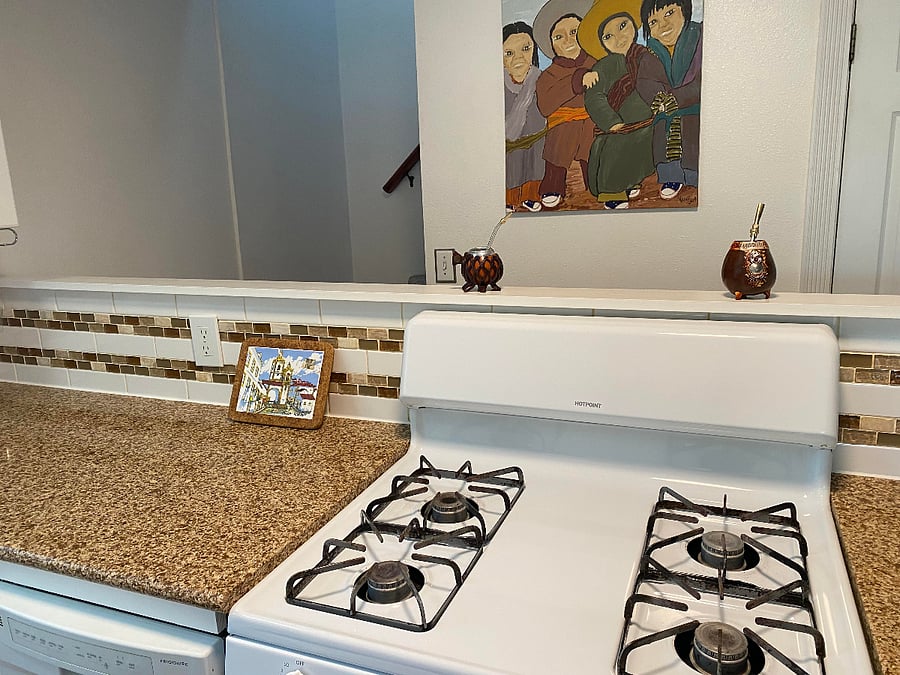 Stone counter tops and tile backsplash