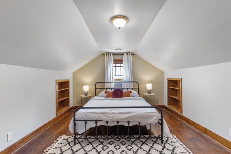 attic bonus bedroom,Queen sized mattress, dresser and plenty of closet space, this room is not attached to the central AC but there is a wall unit in the window that works great in the summer.