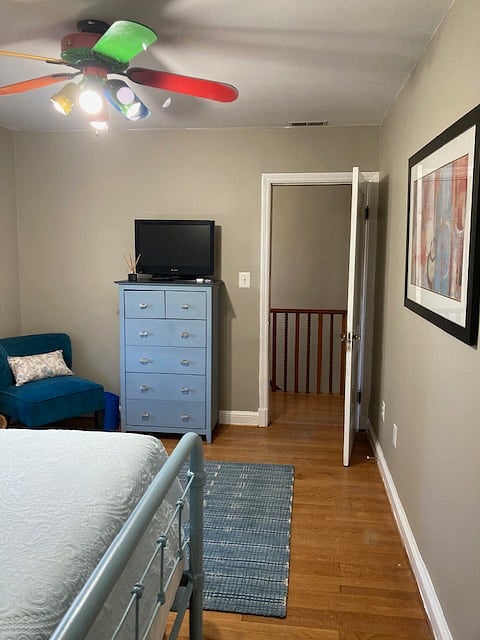 Mercer Room- full bed, chest, accent chair, rug, storage bench, TV. Separate Private bathroom.