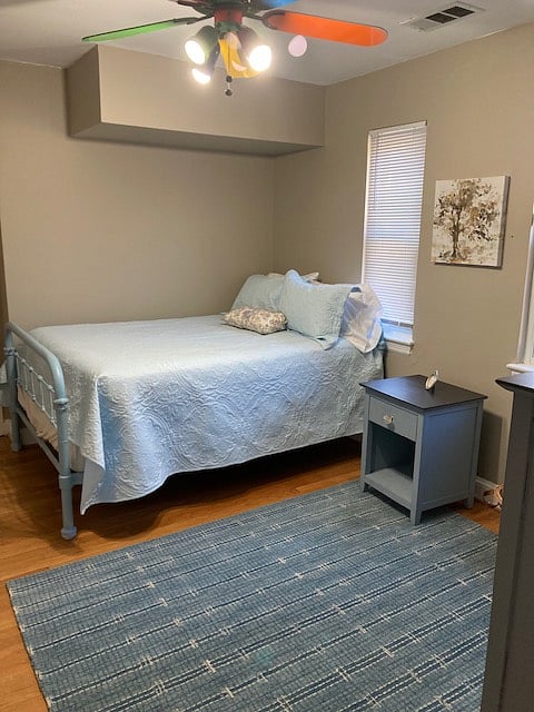 Mercer Room- full bed, chest, accent chair, rug, storage bench, TV. Separate private bathroom.