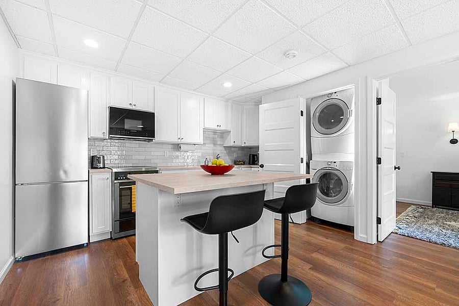Kitchen Area showing Open Laundry Closet Door