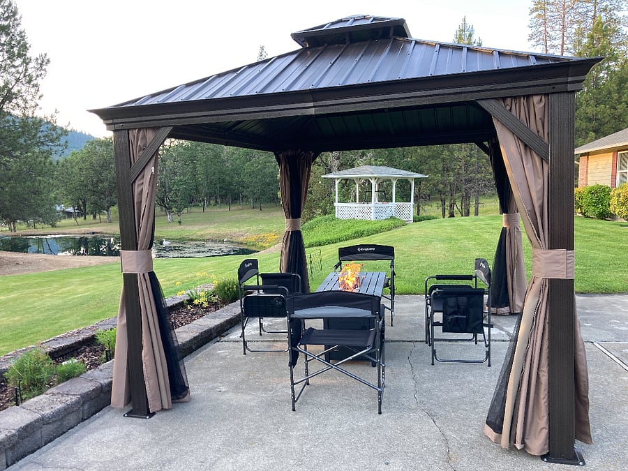 Covered sitting area with fire table