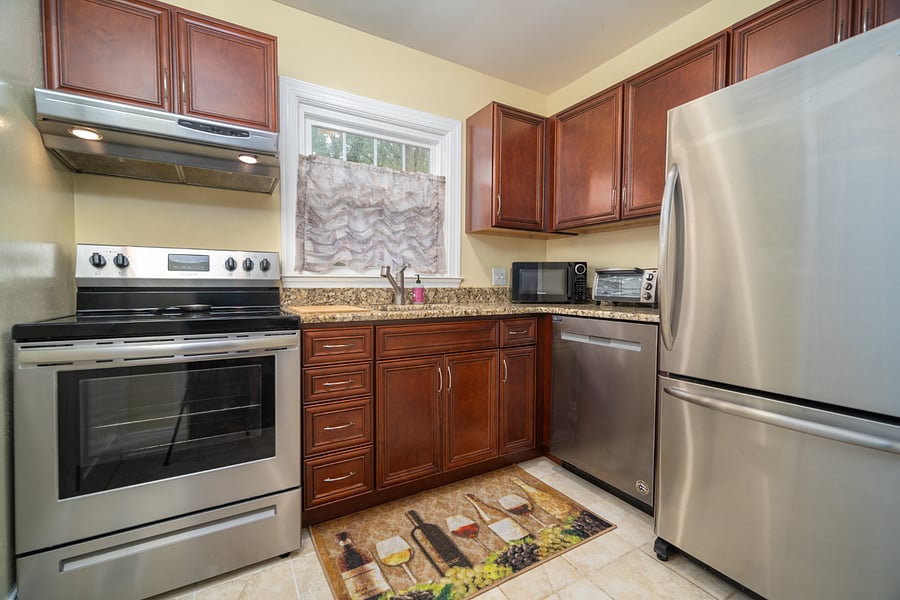 Fully stocked kitchen, microwave, toaster, coffee maker