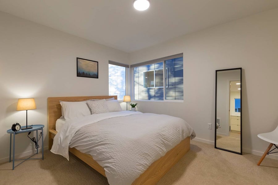 Tuft & Needle foam mattress, light-blocking Hunter-Douglas roller shades, 2 closets for storage.