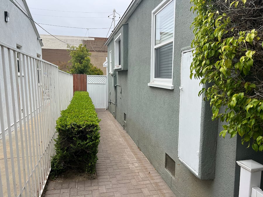Walkway with gate to studio 