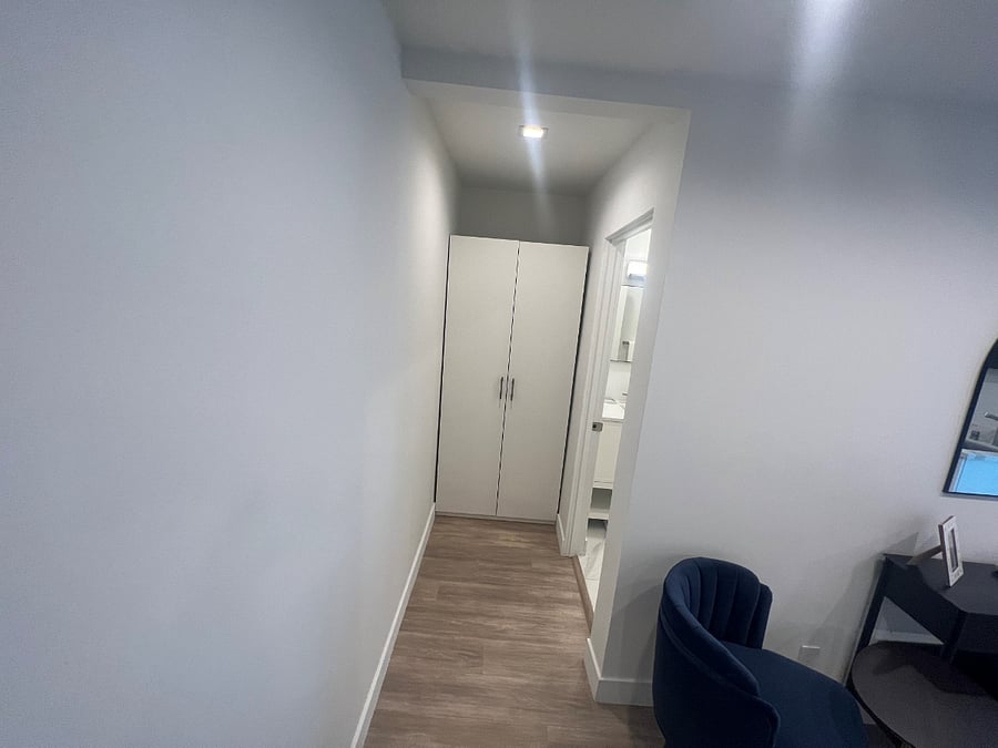 Hall to closet and bathroom