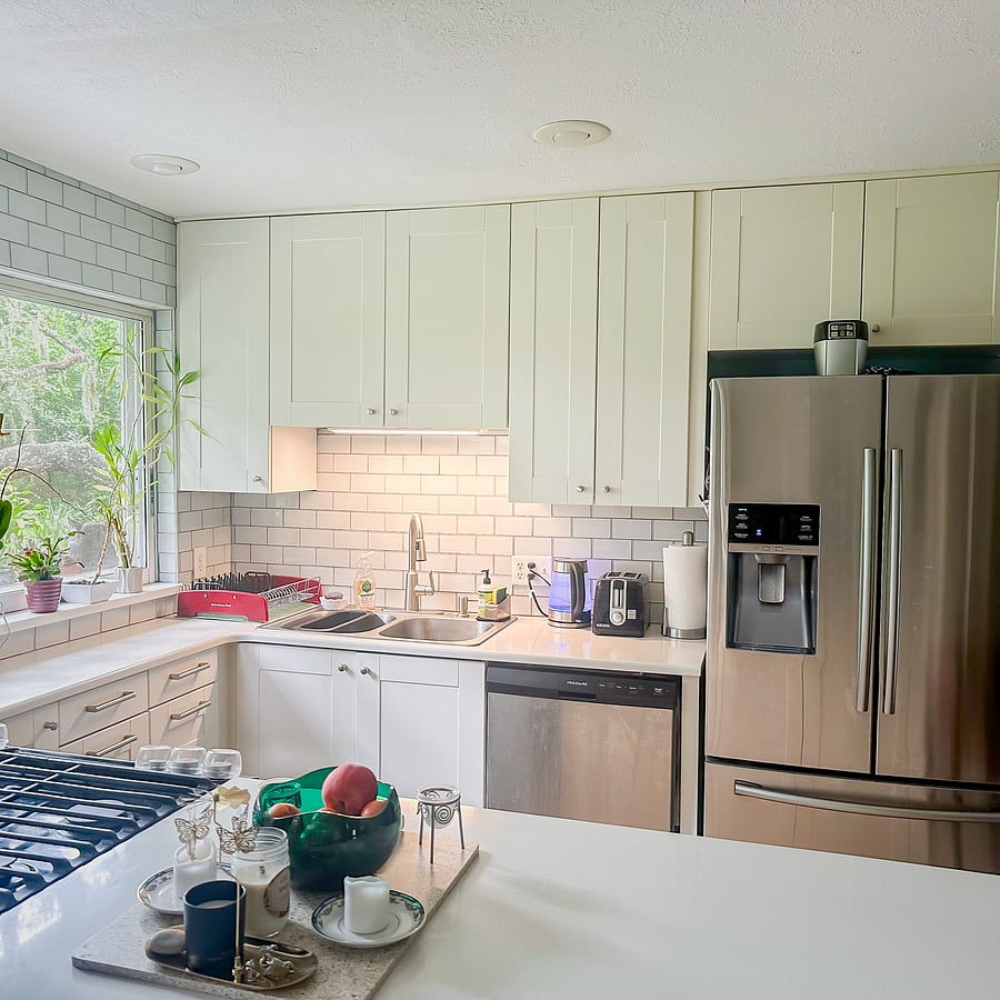 Full-size refrigerator, dishwasher, double sink and kitchen essentials included.