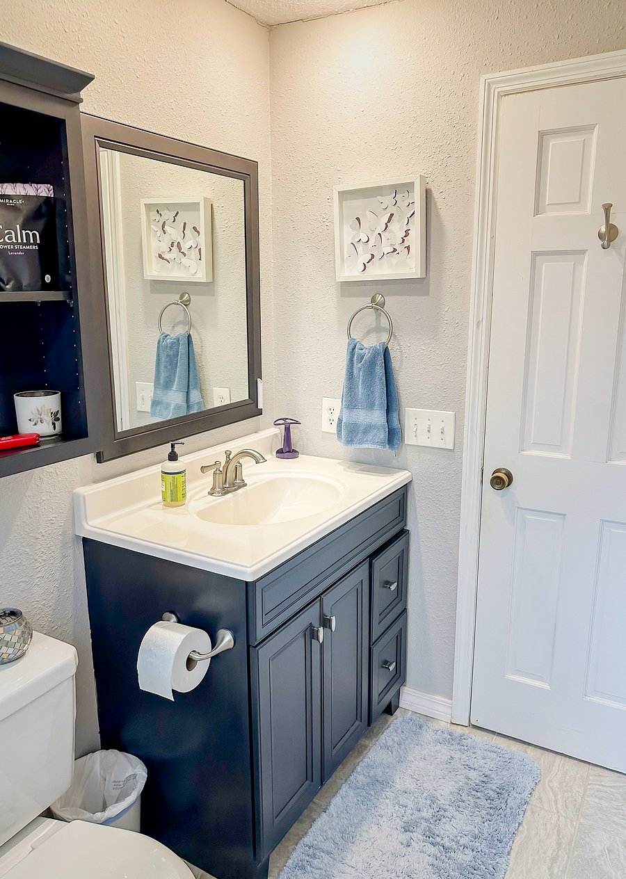 Your private bathroom with starter toiletries, cleaning supplies provided, and professional monthly maid service is included.
