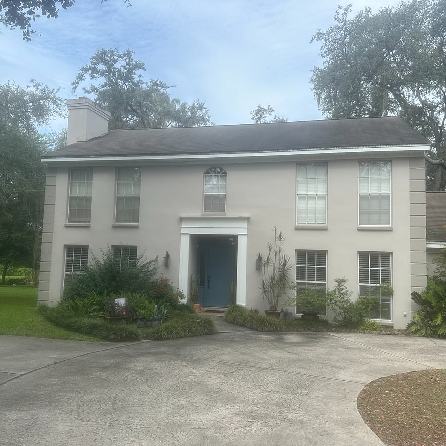 You will park in the driveway & enter through the blue front door