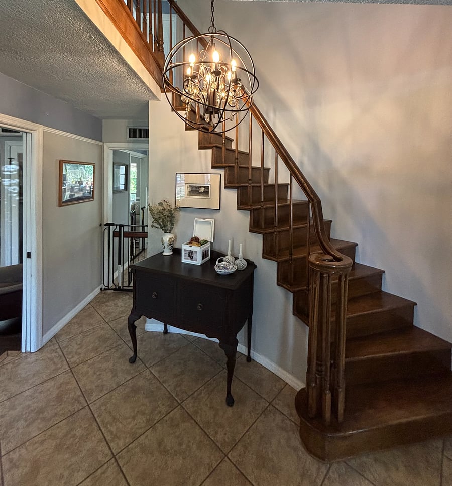 Foyer where you'll enter and take stairs up to private bedroom and bathroom