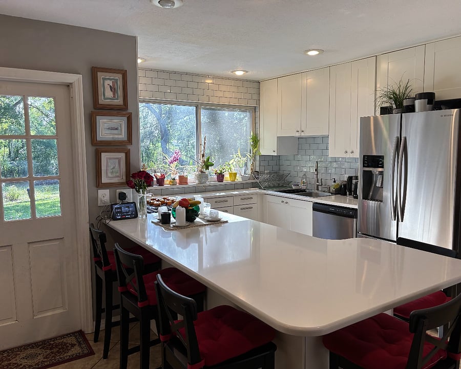 Kitchen bar includes seating for five