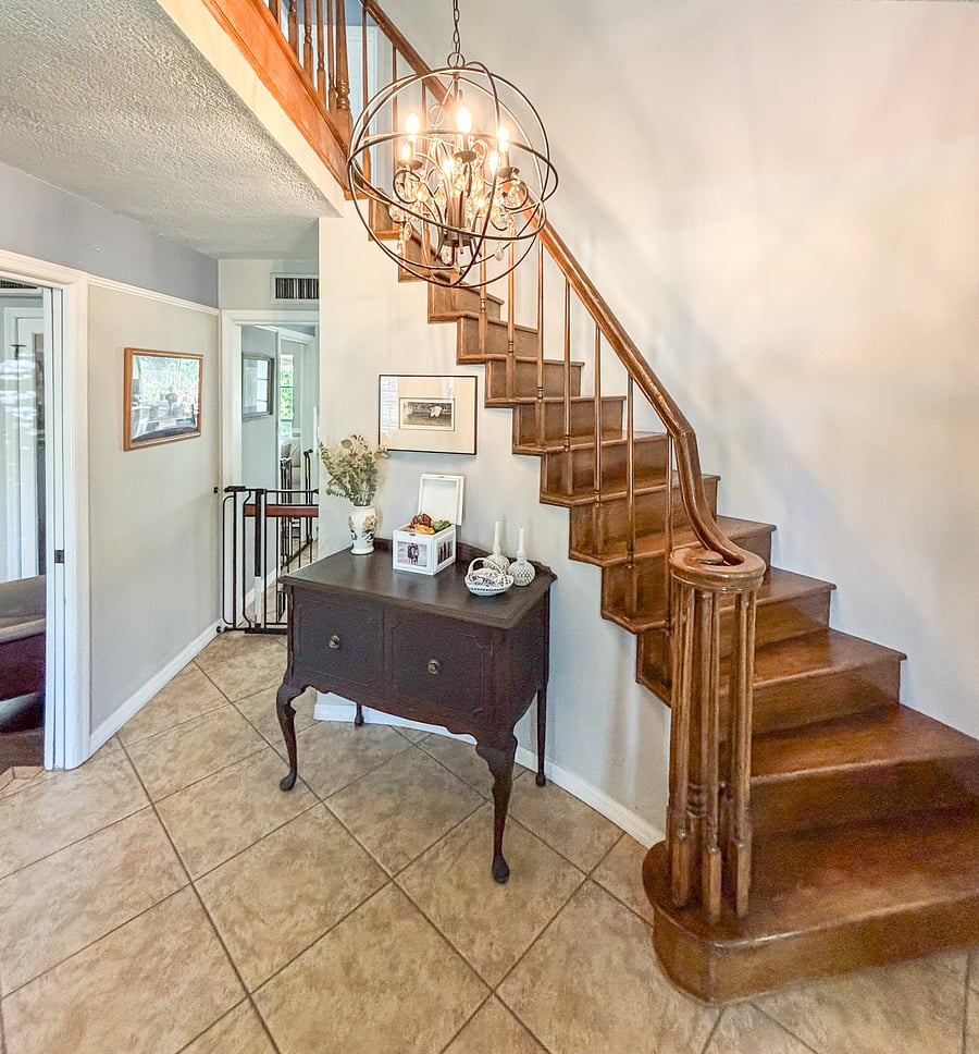 Welcoming front entry leading upstairs to your private bedroom and bathroom.