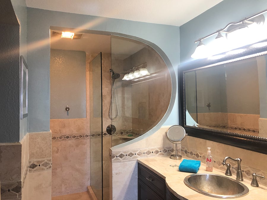 Master bathroom with glass shower for ocean view