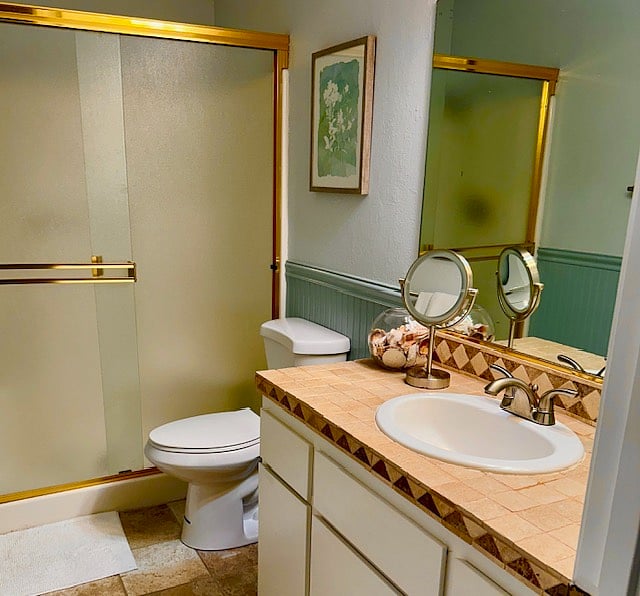 Guest bathroom with additional shower