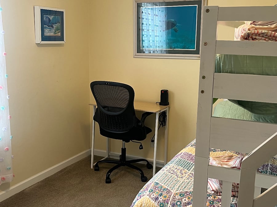 Bring your laptop and check in with the office at the portable workstation with comfortable office chair