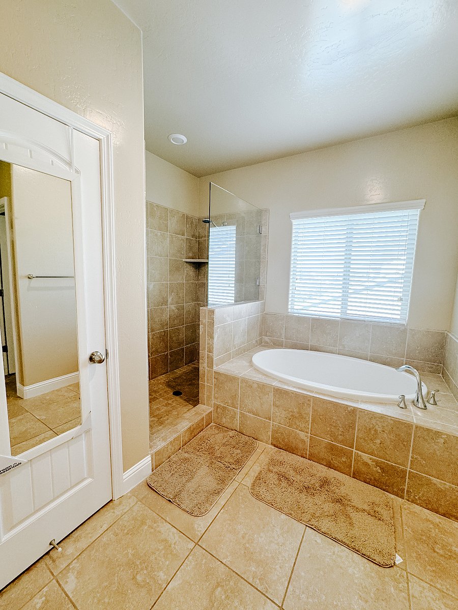 Separate bathtub with standing shower