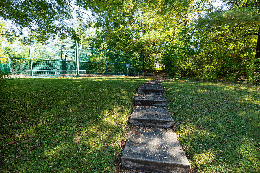 Pathway from the driveway to tennis courts. 