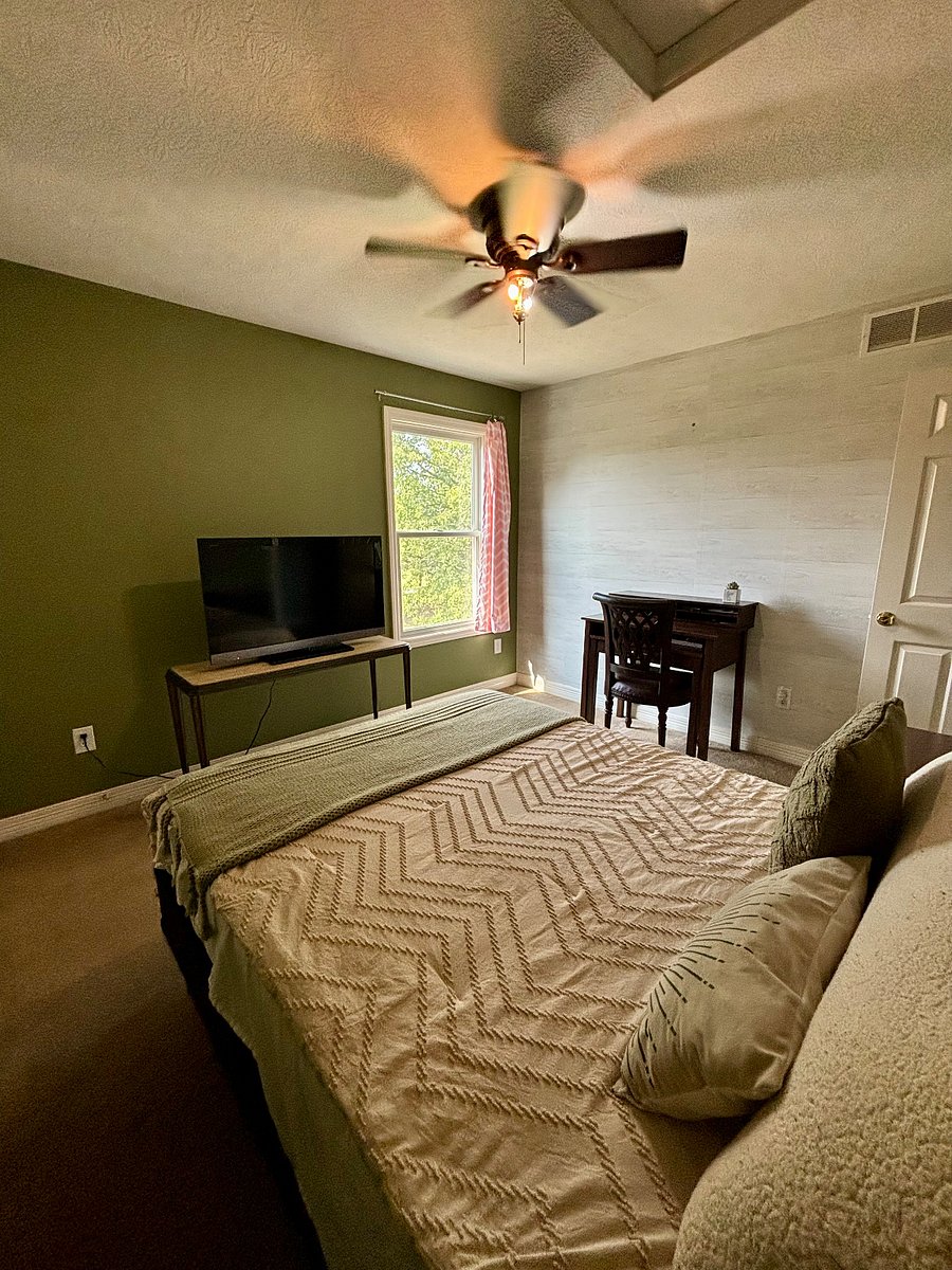 Your private bedroom with Smart TV, double closet, and person desk.