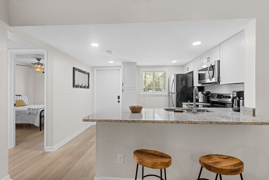 Kitchen bar features seating for 2.