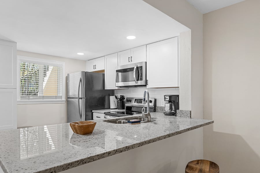 Kitchen bar features seating for 2.