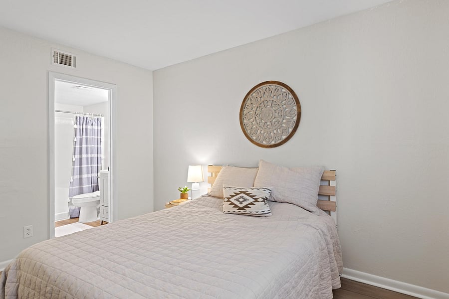 The bedroom features a comfortable queen bed and is equipped with a smart TV, offering a perfect spot to unwind and enjoy your favorite shows.






