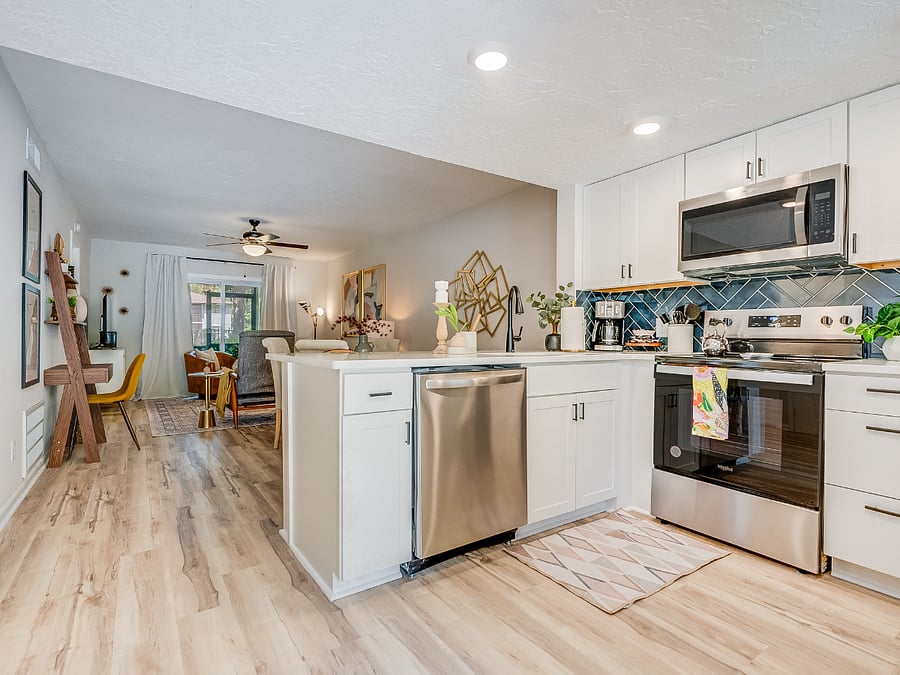 The kitchen at Bluffside Charm is a chefs dream, featuring modern appliances, ample counter space, and all the essentials you need to prepare delicious meals during your stay.