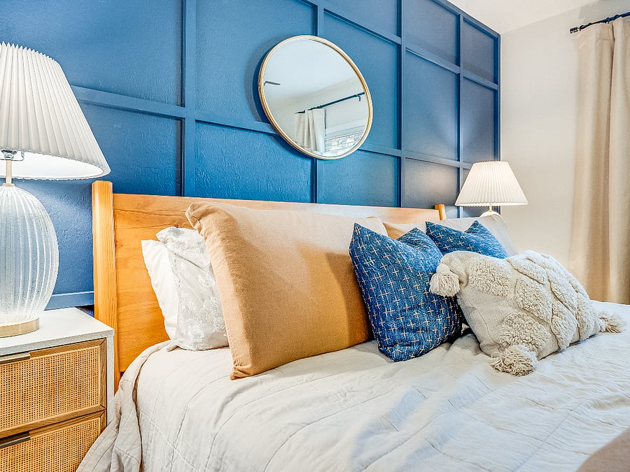 The primary bedroom at Bluffside Charm is a peaceful oasis, complete with a plush queen bed, an ensuite bath, and a smart TV, perfect for unwinding in comfort and style.