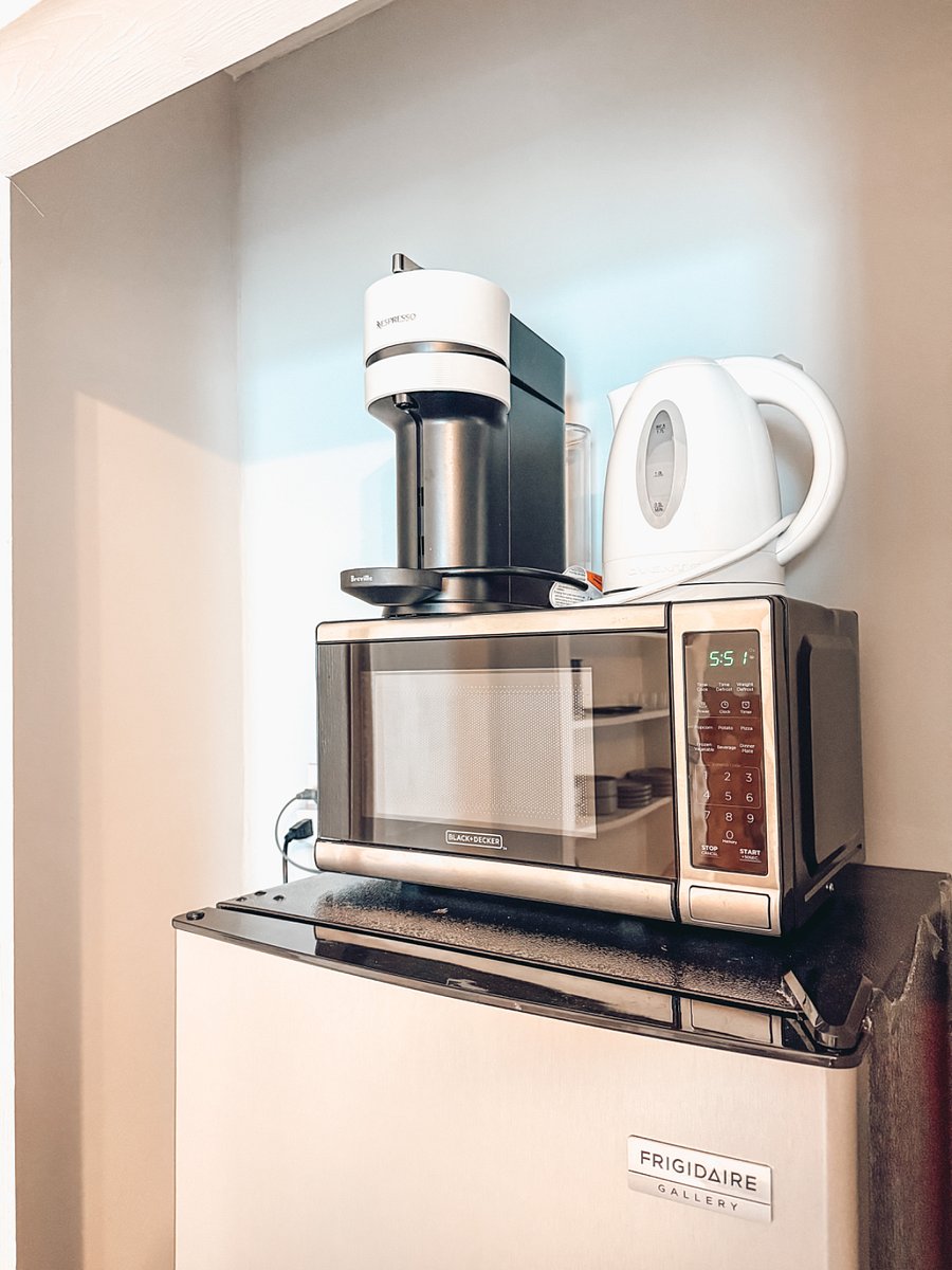 Nespresso coffee machine, electric kettle and microwave. We also have a double stove top available 
