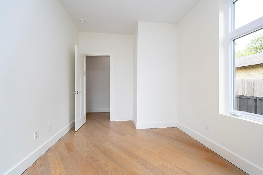 This is the bedroom. It is furnished with a queen bed and dresser.