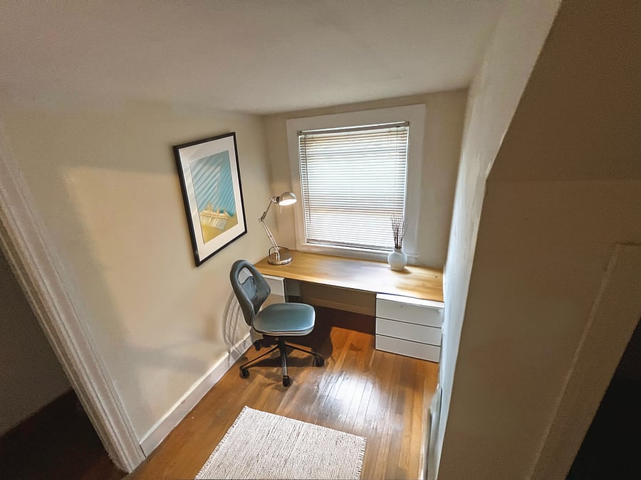 1st bedroom's big closet that we turned into a small workspace or place to chill next to the window. Otherwise plenty of storage and closet space for clothes and other things