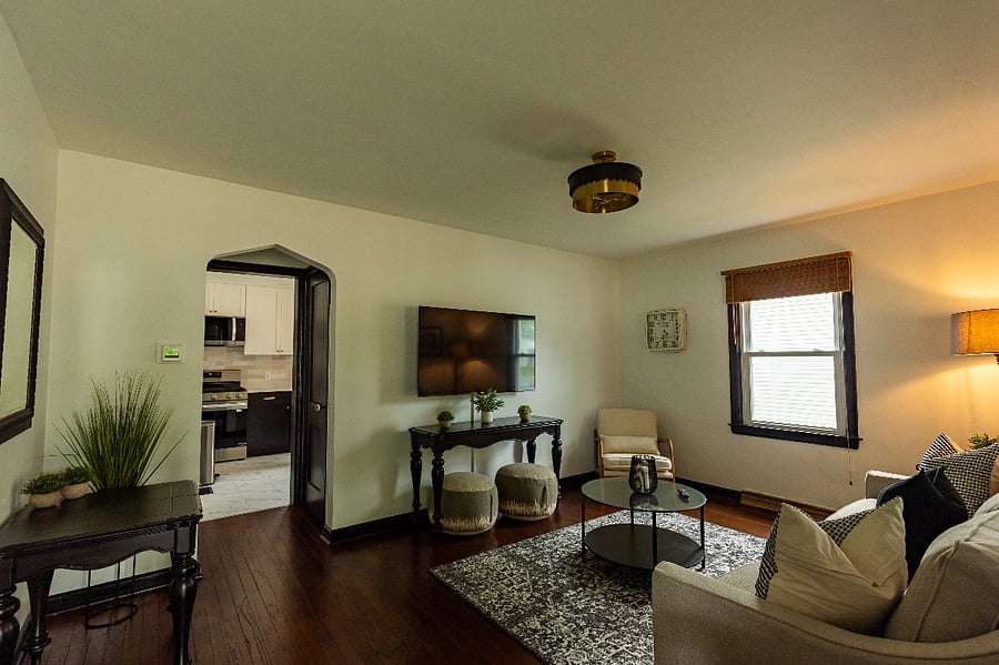 Smart TV in living room - linen closet - hallway to kitchen