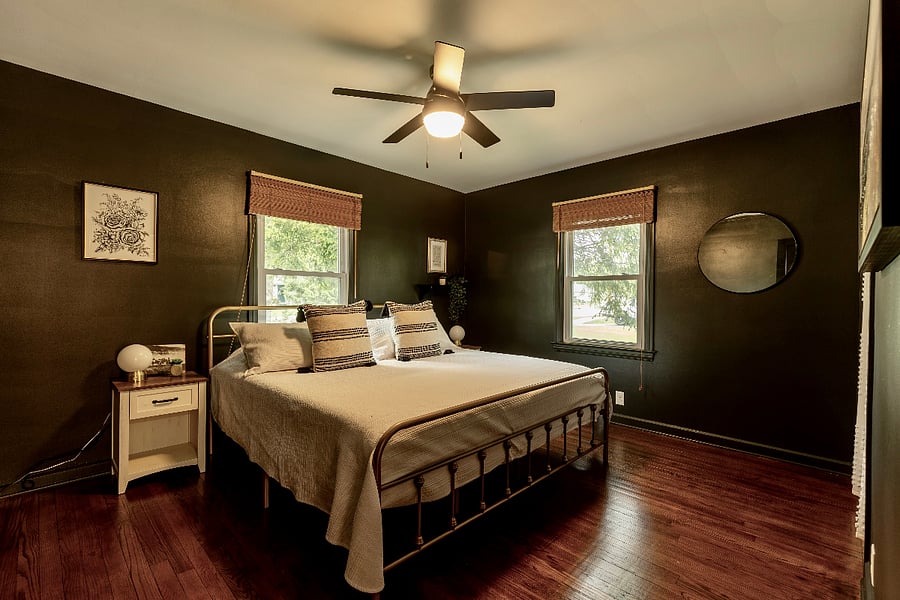 First bedroom (faces street), with king size bed. Bedroom has a closet.
