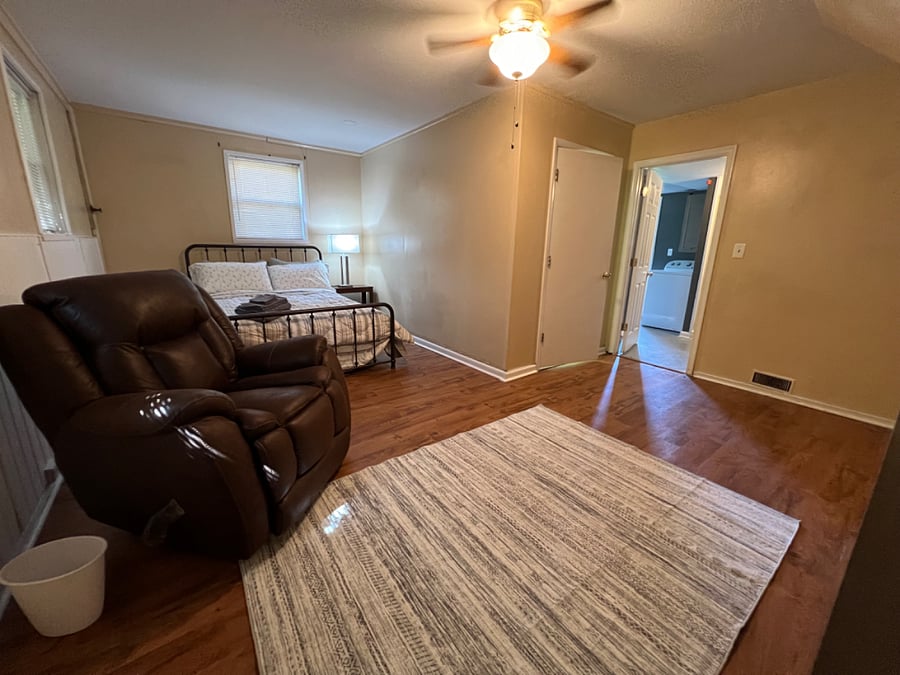 Bedroom #D - w Queen bed, Sitting area w Lazyboy, attached bath, large closet. Private entrance and washer dryer area.  w ALL utilities 