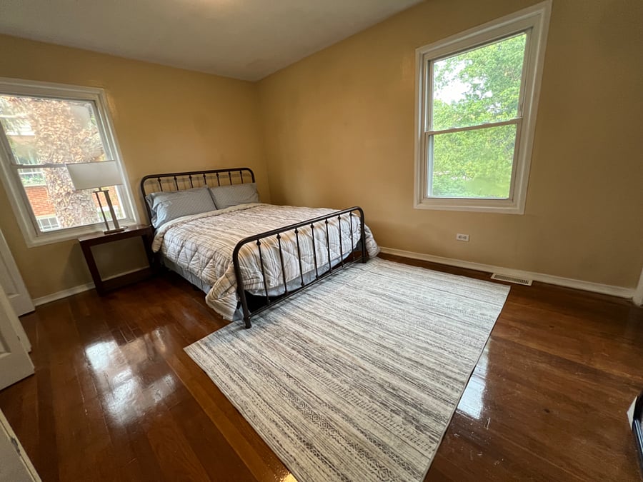 Bedroom #C - w Queen bed, 2 closets, shared bath, faces backyard, quiet. 