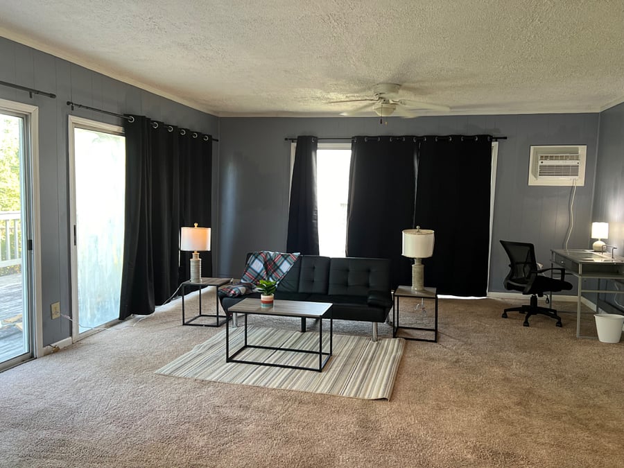 Bedroom #E -  Very large bedroom with Queen bed, sitting area, desk n chair, lots of natural light walkout to backyard deck. Private entry thru garage.Shared kitchen, Dining and bathroom. Personal refrigerator. Luxurious