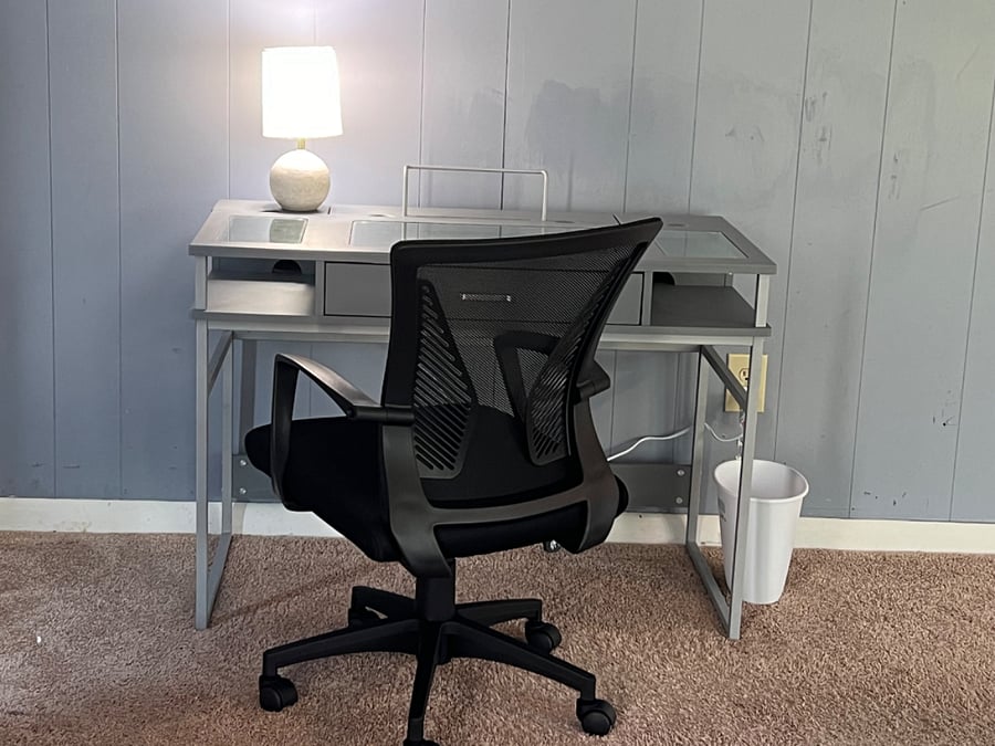 Bedroom #E - Very large bedroom with Queen bed, sitting area, desk n chair, lots of natural light walkout to backyard deck. Private entry thru garage.Shared kitchen, Dining and bathroom.